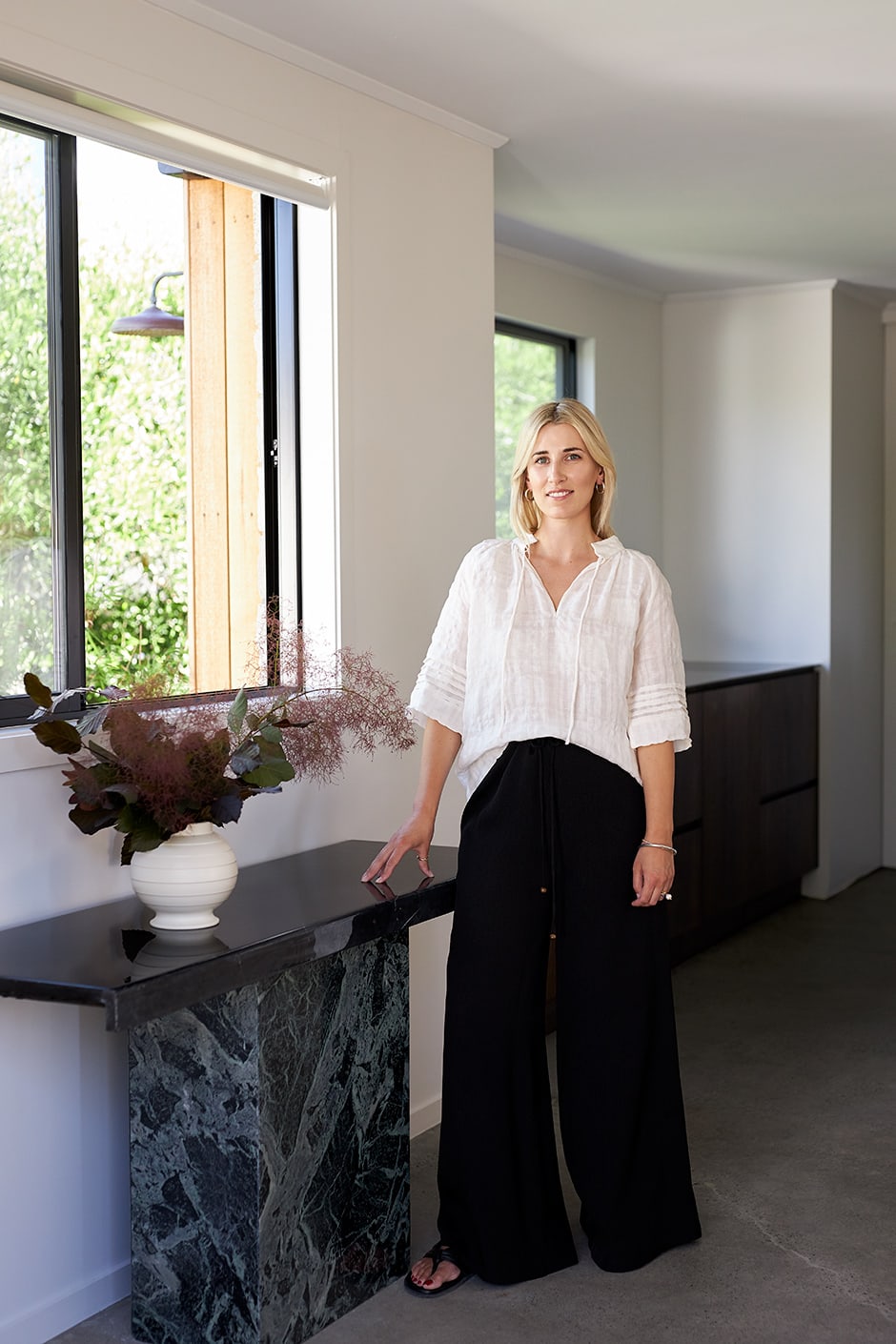 Fashion designer Juliet Souter of Marle grounds herself at home in Mt Maunganui